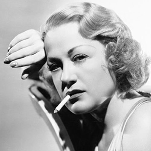 Black and white vintage photo of woman with cigarette in her mouth